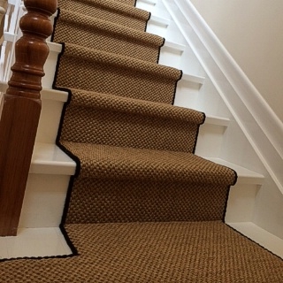 Natural Rustic Sisal With Black Overlocking On Stairs